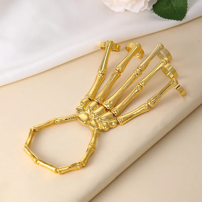 BELLEGIRL 2022 new design custom packaging finger rings Punk style skeleton hand bone adjustable five finger ring bracelet