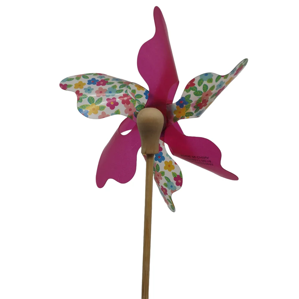 
children hand carry windmills for national day holiday party festival play fun toy 