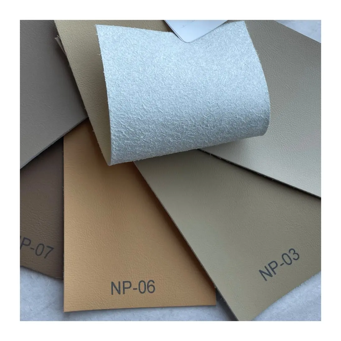 
Stock lot Smooth Microfiber Backing PU Synthetic Leather for Automotive 