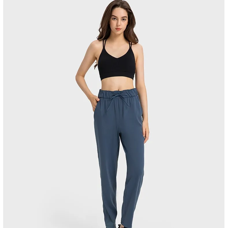 Quick drying straight leg cropped pants casual loose yoga exercise pants for women with high elasticity and skin friendly nudity