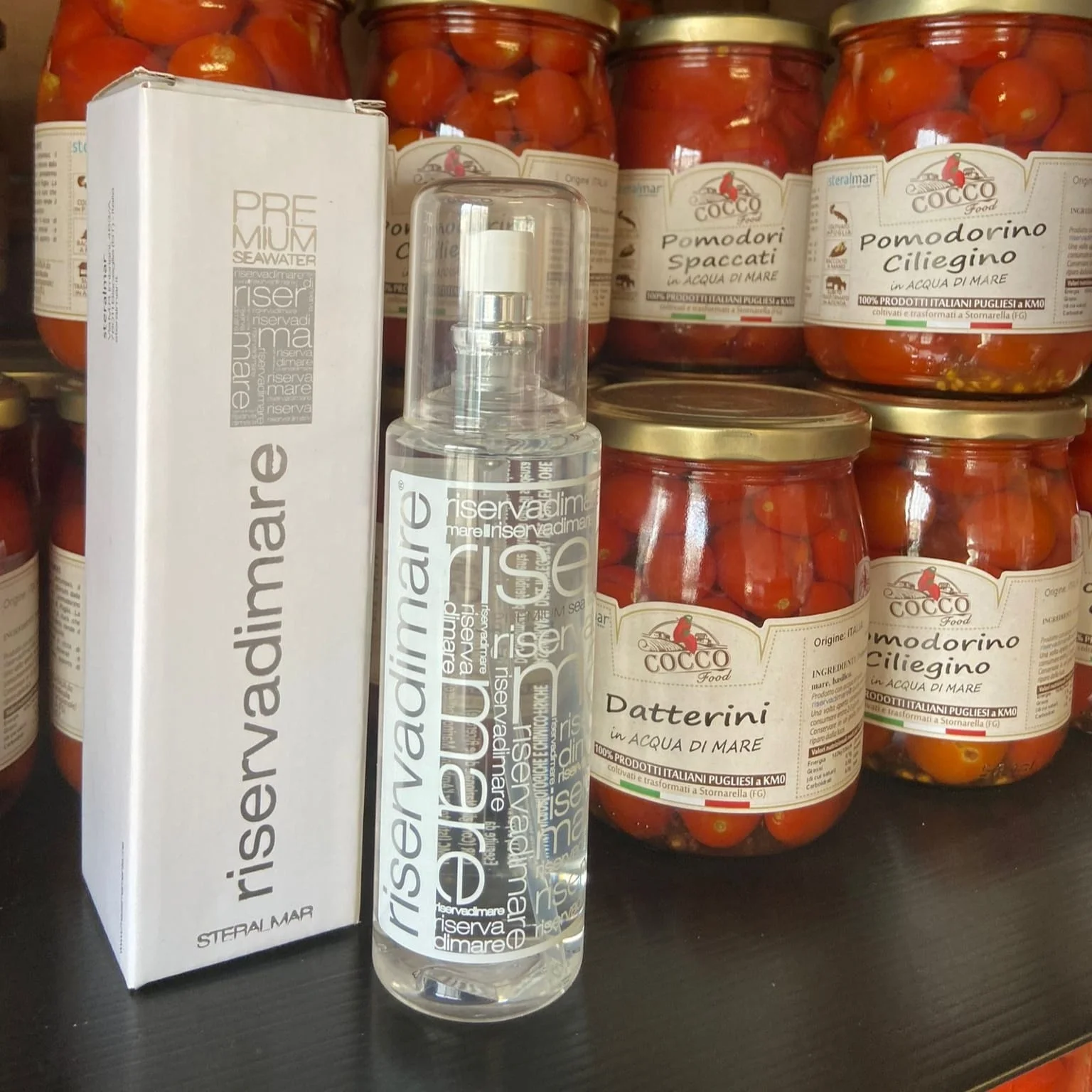 Gourmet Product Mineral Salts And Trace Elements Whole Red Cherry Datterino Tomatoes In Sea Water For Luxury Restaurant