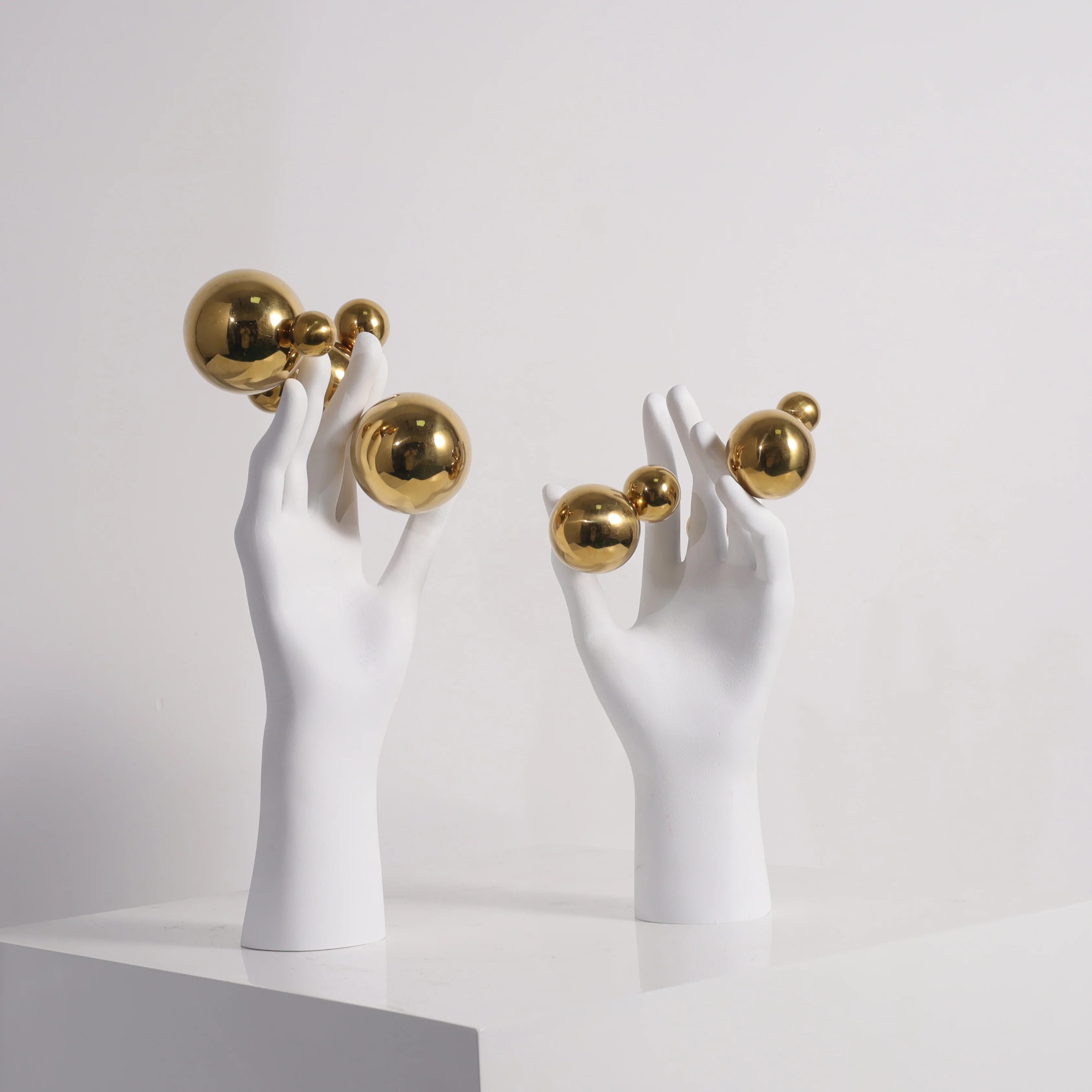 guangzhou home decor desktop art cafe decoration art pieces modern sculpture hands figure golden ball resin art accessories
