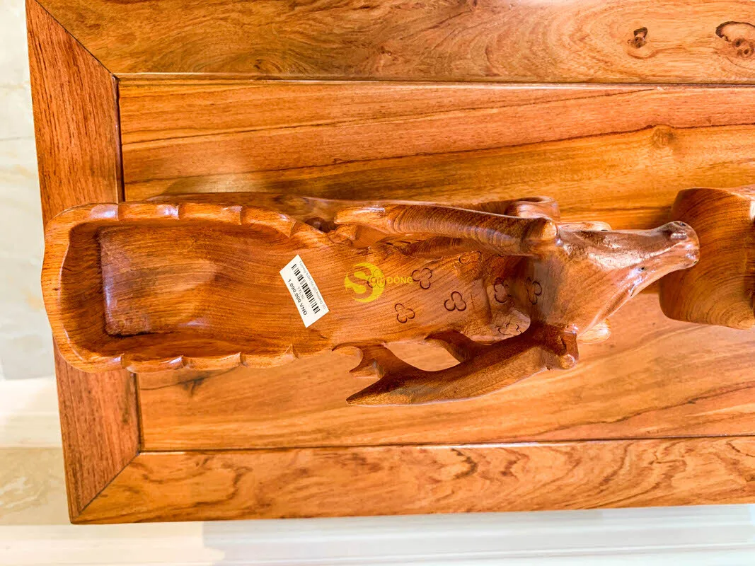 Reindeer pull cart carrying bottles of wine