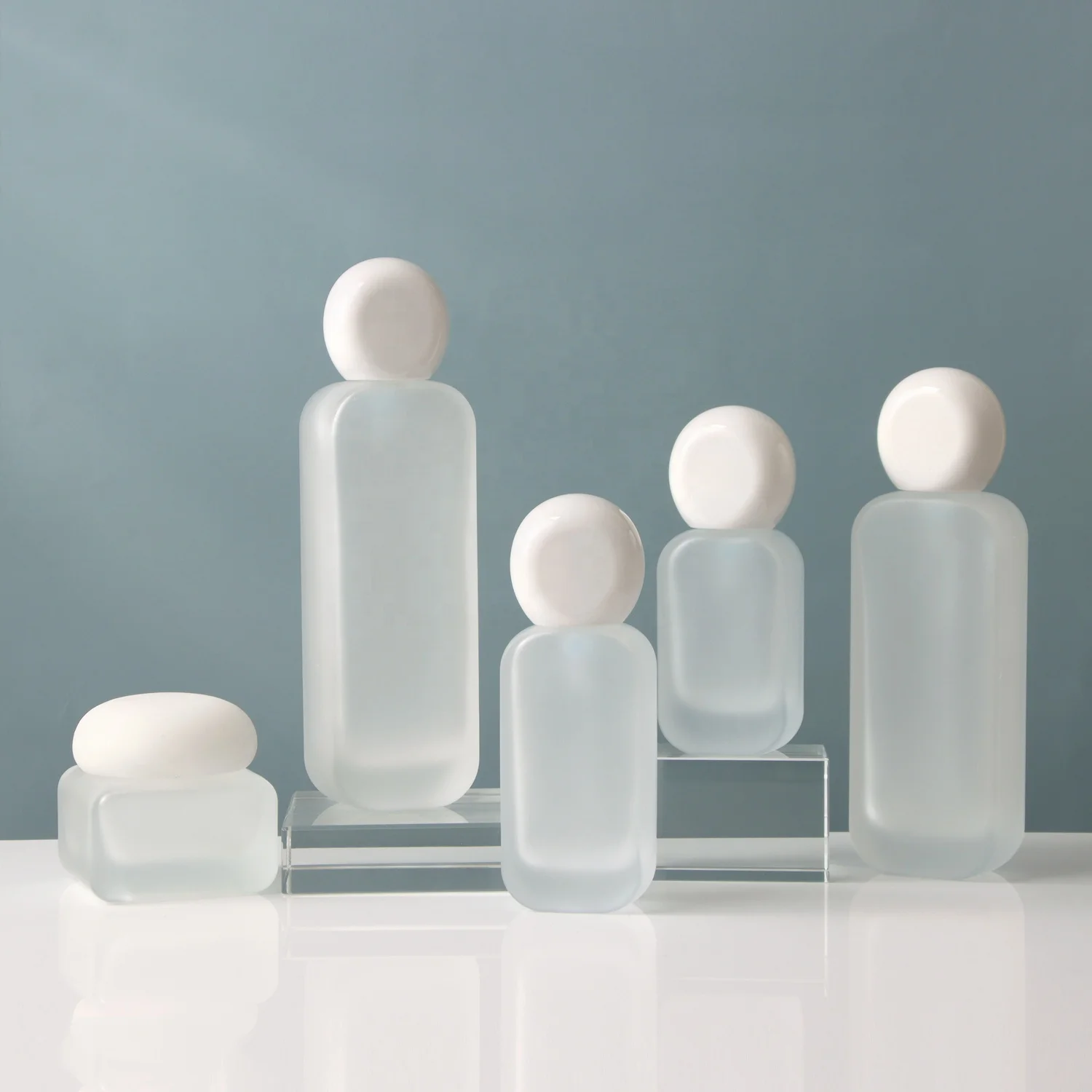 Wholesale clear black cosmetic packaging essence oil container square skincare set bottle glass 30g 50g face cream jar with lid