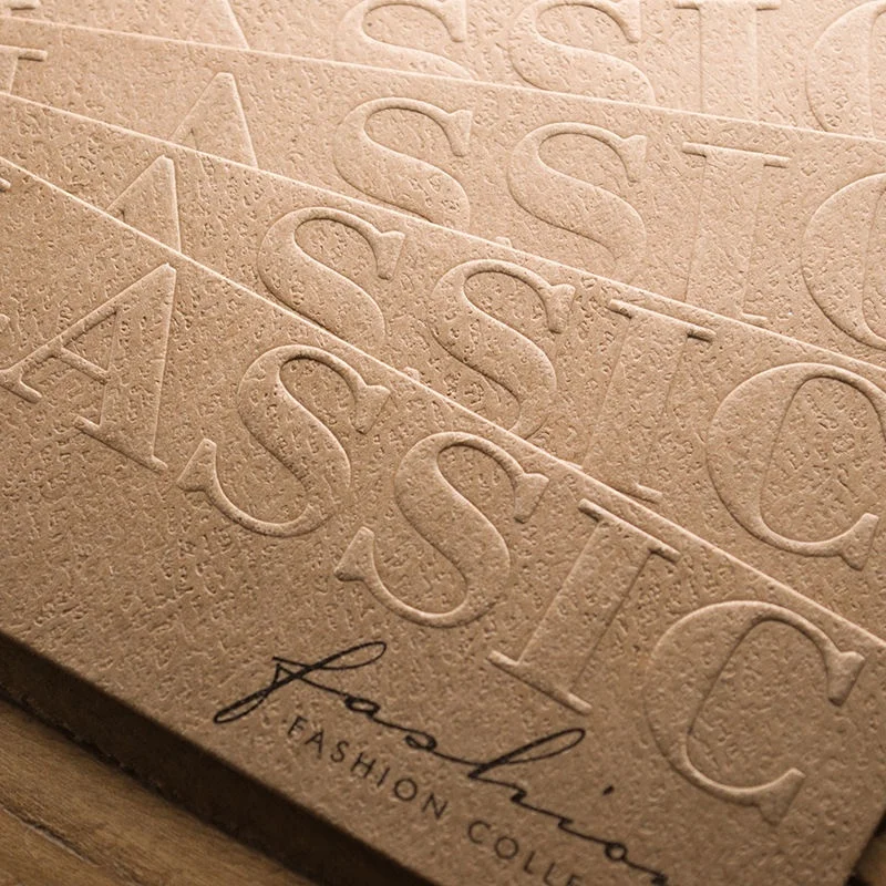 Cheap Custom Kraft Paper Hang Tags Embossed  Jeans Hang Tag Cloth Tag With Custom Printed Logo