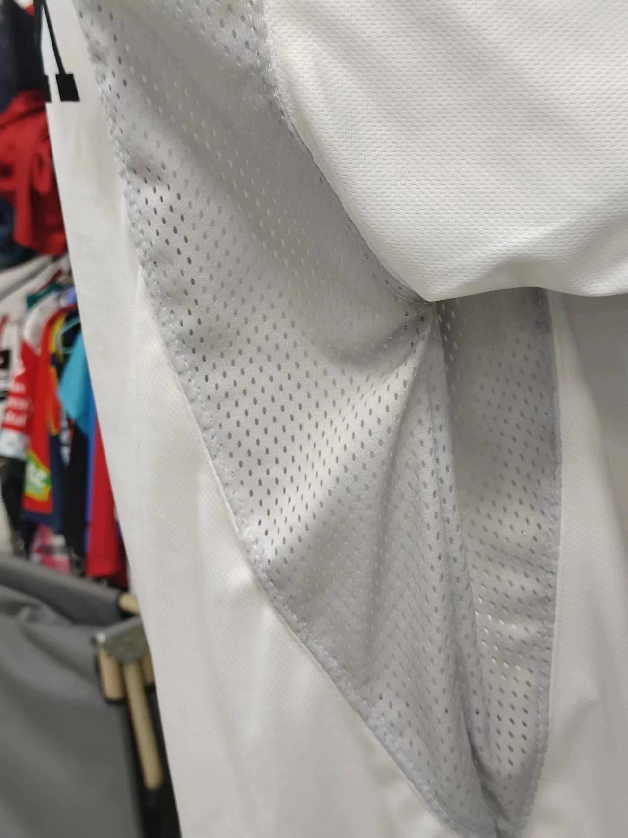 Custom white mesh fabric sublimation breathable loose protective hockey jersey uniform for man woman