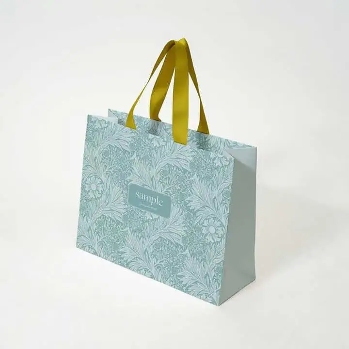 Luxury clothing retail gift paper bag shopping packaging paper bag with handle