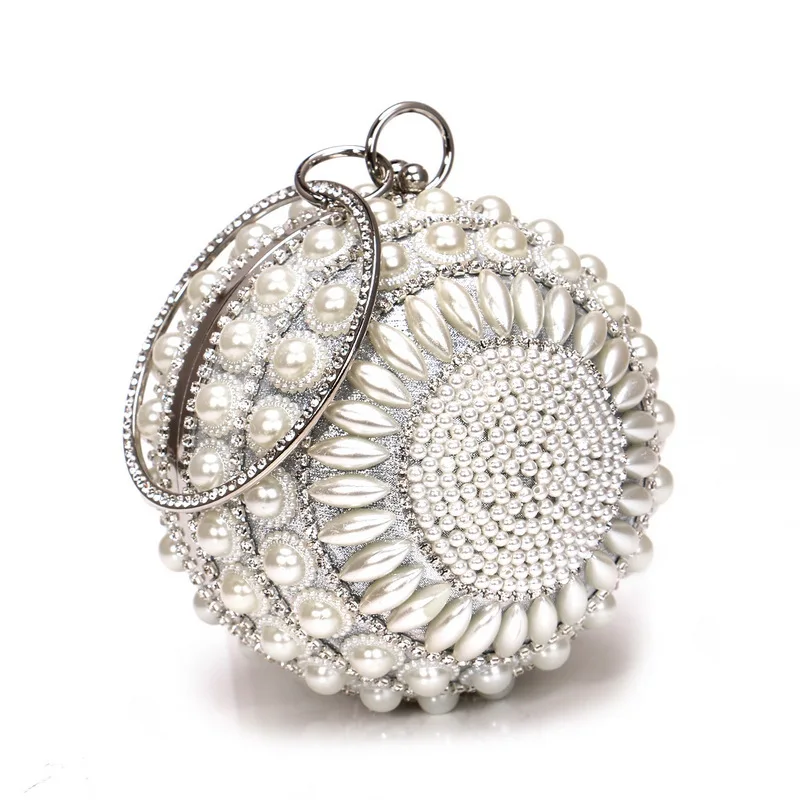 The new ball design with rhinestone paste is suitable for large banquet party hand bag clutch bag evening metal bag