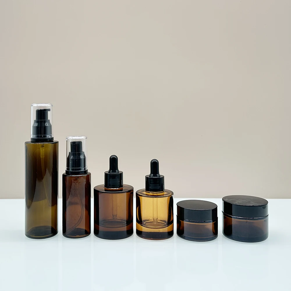 Luxury cosmetic skincare packaging 50g glass cream jar frost clear glass bottles face cream jars set 30ml 50ml 100ml