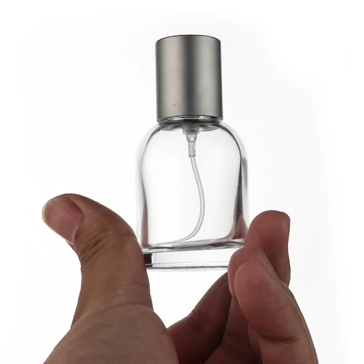 Empty luxury elegance ready stock 30ml custom logo perfume packaging 50 ml 100ml new glass bottle for perfume