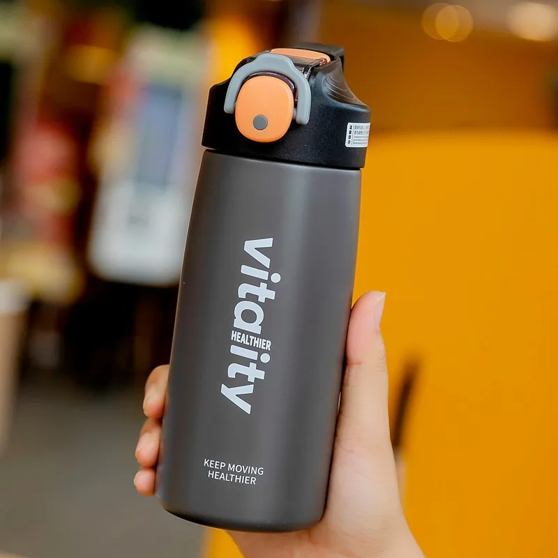 One-handed opening suction nozzle type thermos cup stainless steel bouncing lid sports water bottle