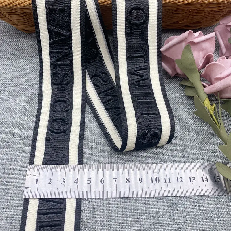 Comfortable Garment Customized Embossed 3D Logo Stripe Knitted Tapes Emboss Engrave Webbing for Sport Wear Pant Side