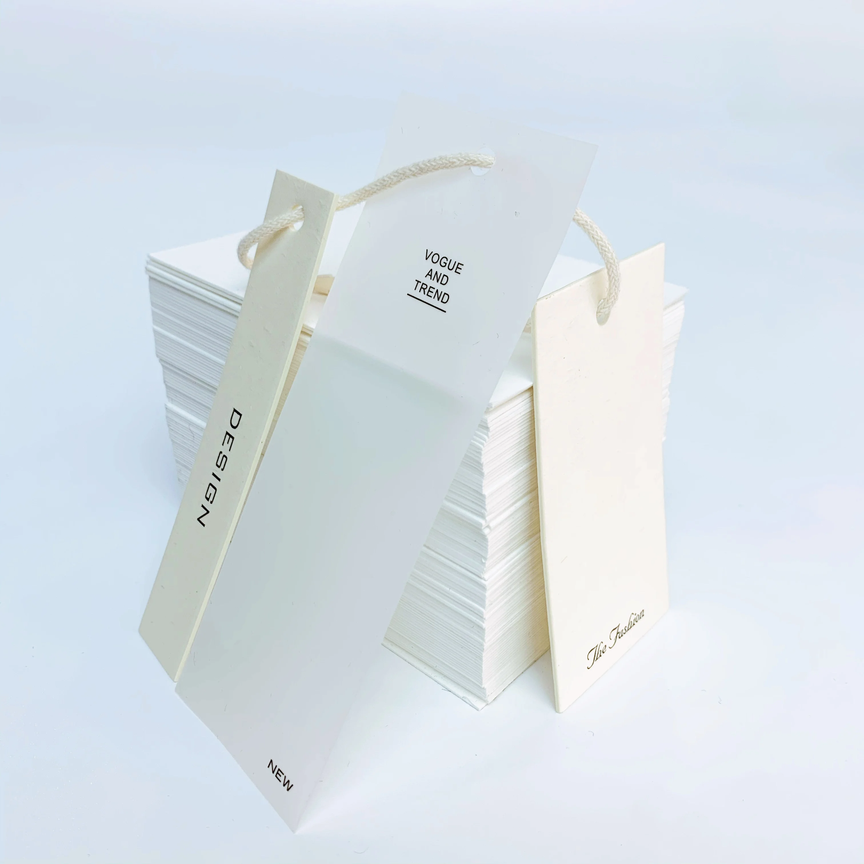 Custom clothing paper swing hanging tags lables translucent embossed pvc luxury printed logo garment hang tag with sting