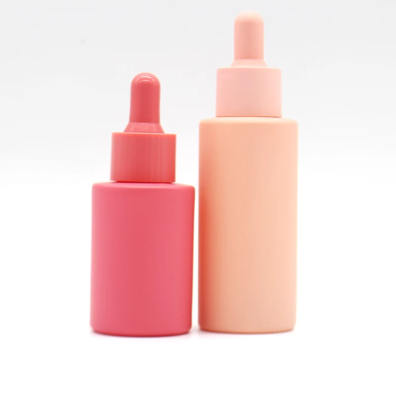 Customize 30ml cosmetic perfume essence 1oz 2oz  frosted glass essential oil pink dropper bottle dropper with box packaging