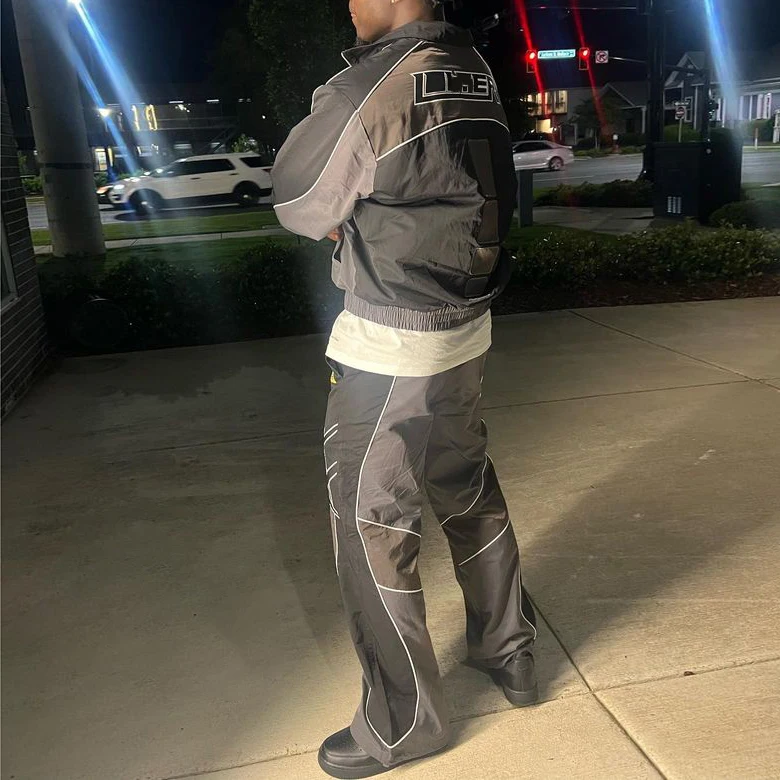 wholesale high quality zip up windproof reflective nylon jacket and track pants windbreaker tracksuit for men