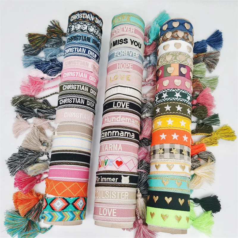 Wholesale Customized Logo Text Fashion Bracelets with Bohemian Ribbon Letter Embroidery and Tassel Weaving for Gift