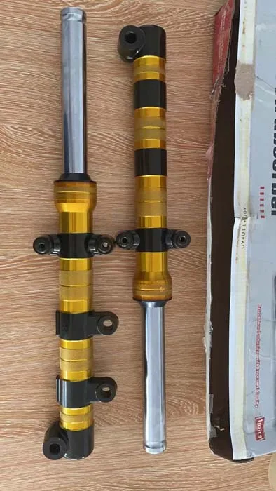 Motorcycle front shock absorber