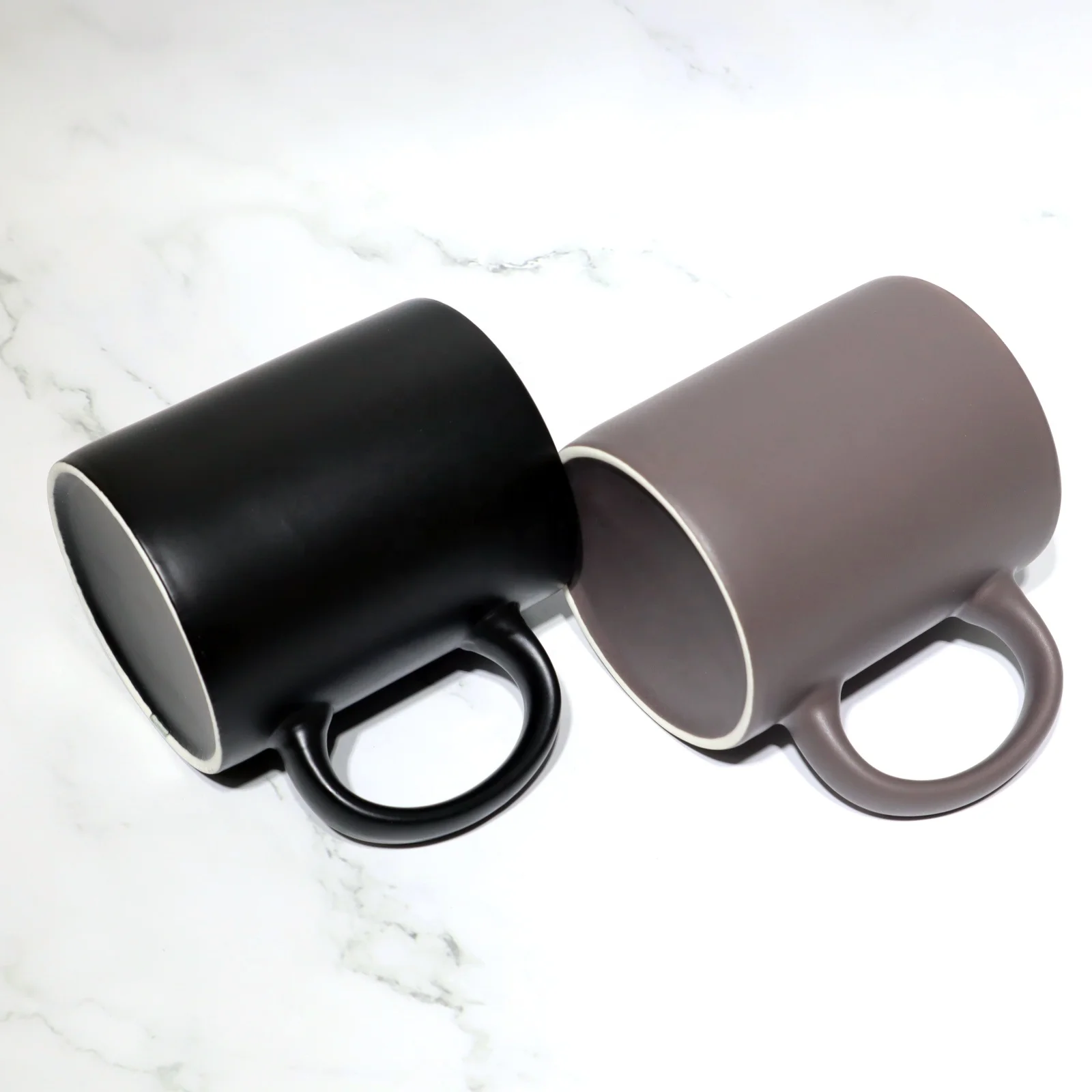 
Porcelain Coffee Mugs And Ceramic Tea Cups Wholesale Blue/Grey/Black Matte Glaze Ceramic Mug Cheap Ceramic Mug With Color Handle 