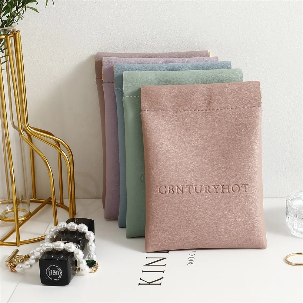 PUPPYSEW Wholesale PU Leather Automatic Closed Shrapnel bag Small Cosmetic Lipstick Pouch  Shrapnel Makeup Jewelry bag WIth logo