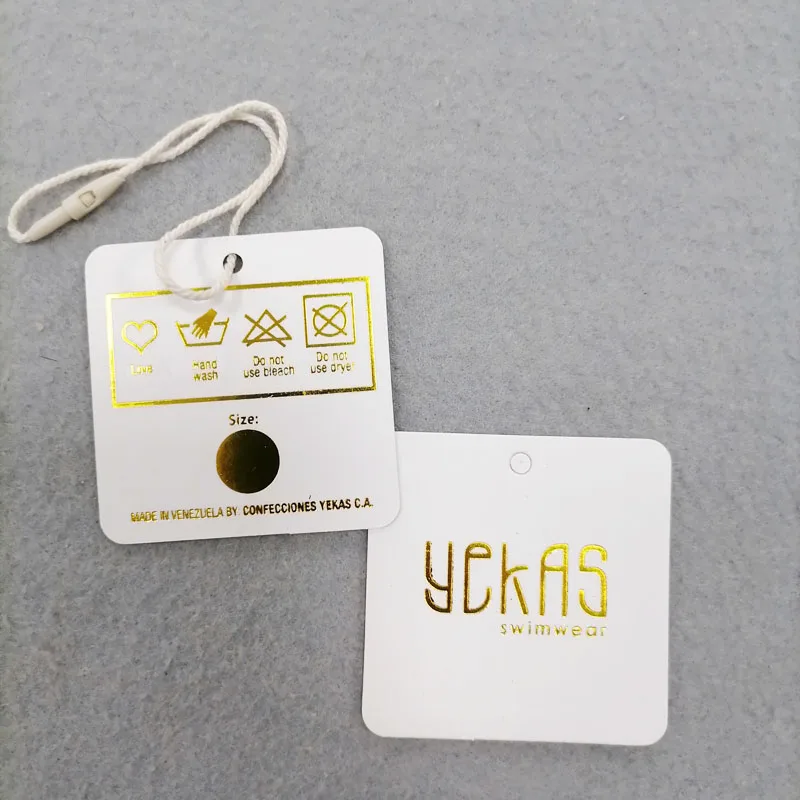 Customize name clothes tags Fashion Design swing tag Wholesale cardboard hangtags Custom paper hang tags for clothing
