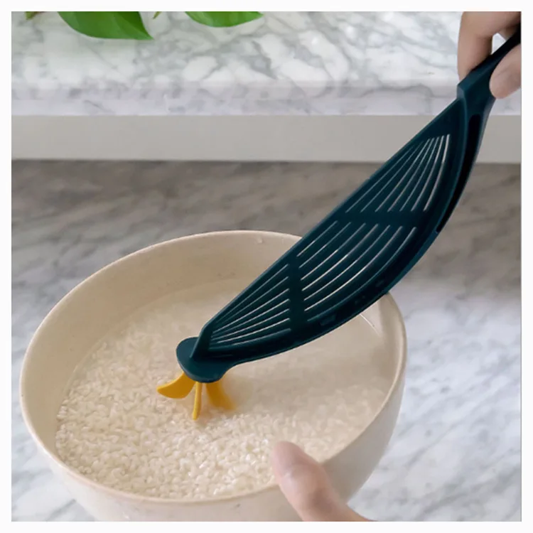 Multifunctional kitchen rice cleaning artifact drain baffle rice washing sieve creative plastic household manual stirring