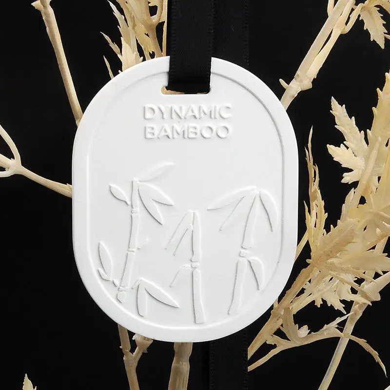 Wholesale wardrobe hanging air freshener ceramic diffuser stone scented aroma stone with perfume