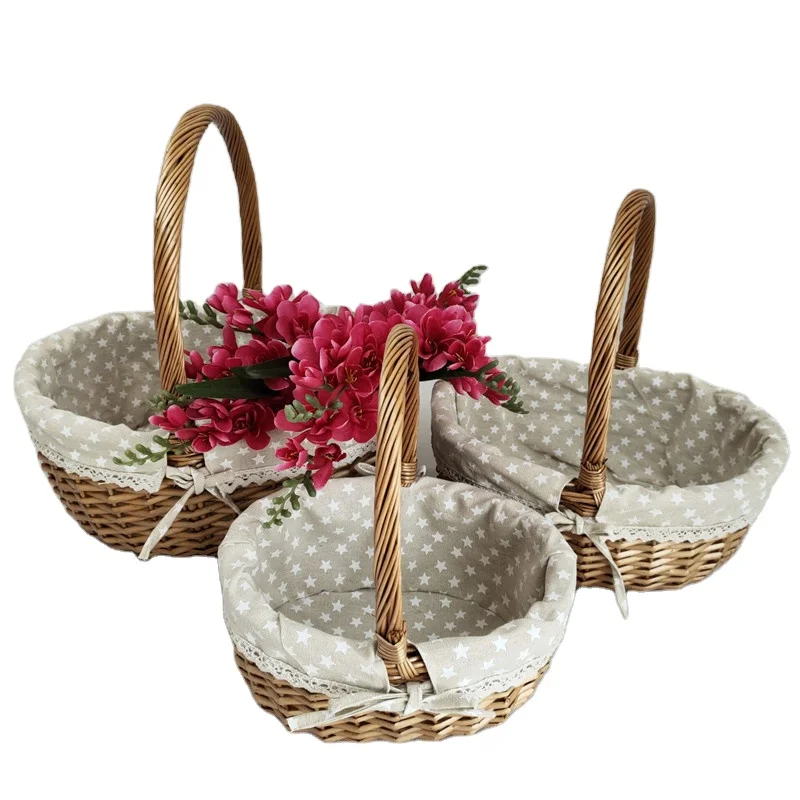 Wholesale modern soft fabric lined willow baskets, fruit and flower decorated storage baskets with handles