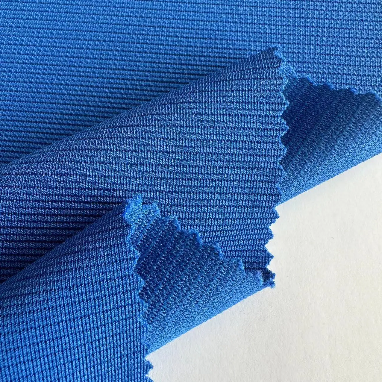 Custom 230gsm stretch ottoman rib fabric polyester spandex solid ottoman fabric for trousers and garment