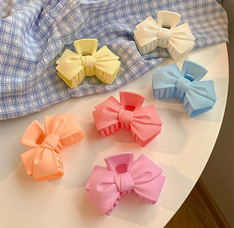 Custom wholesale acrylic durable colorful bow knot spring pink hair clamps claw clip