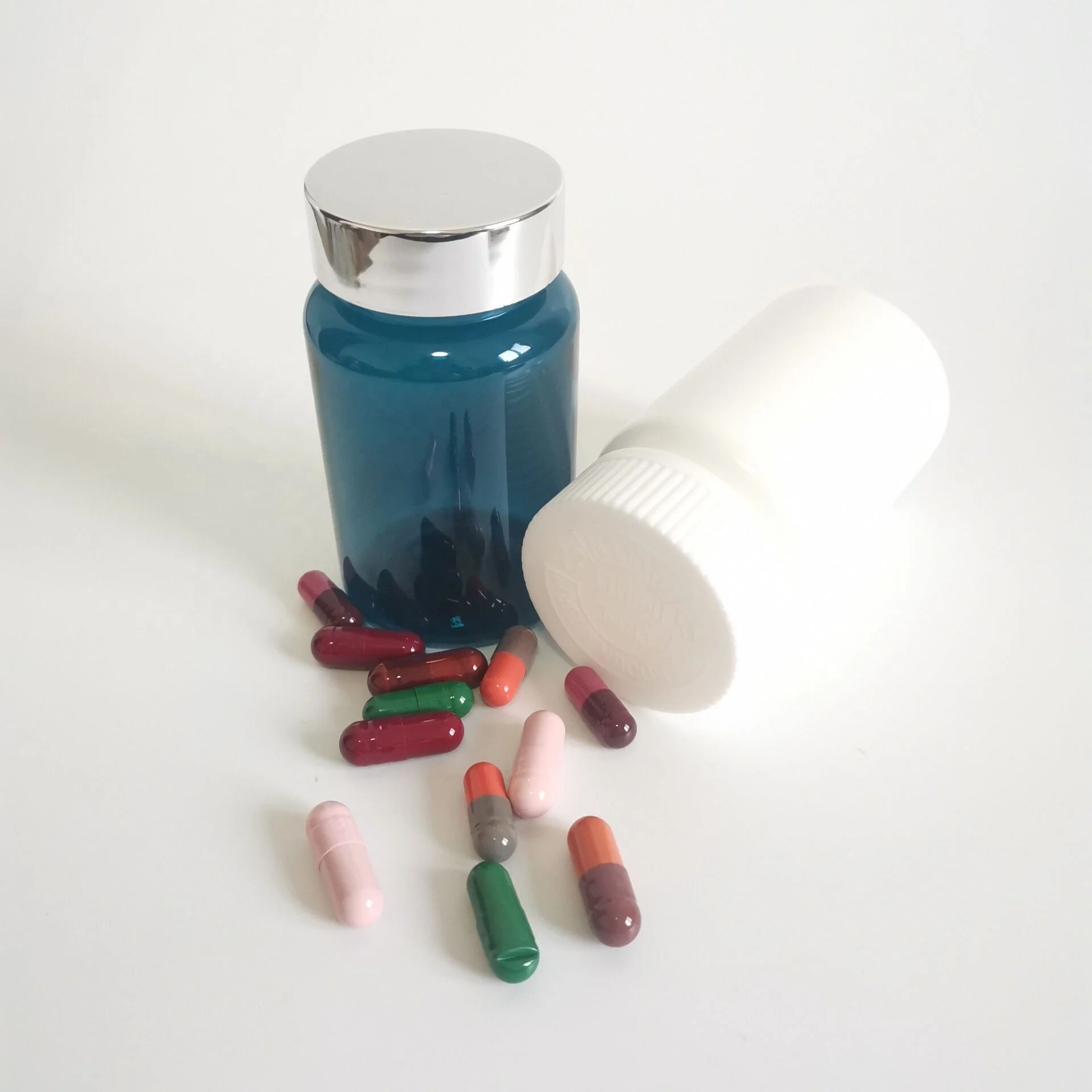 Food Packaging Luxury White Red Green Blue Amber Brown Black PE HDPE PET Plastic Bottle For Pills Capsules