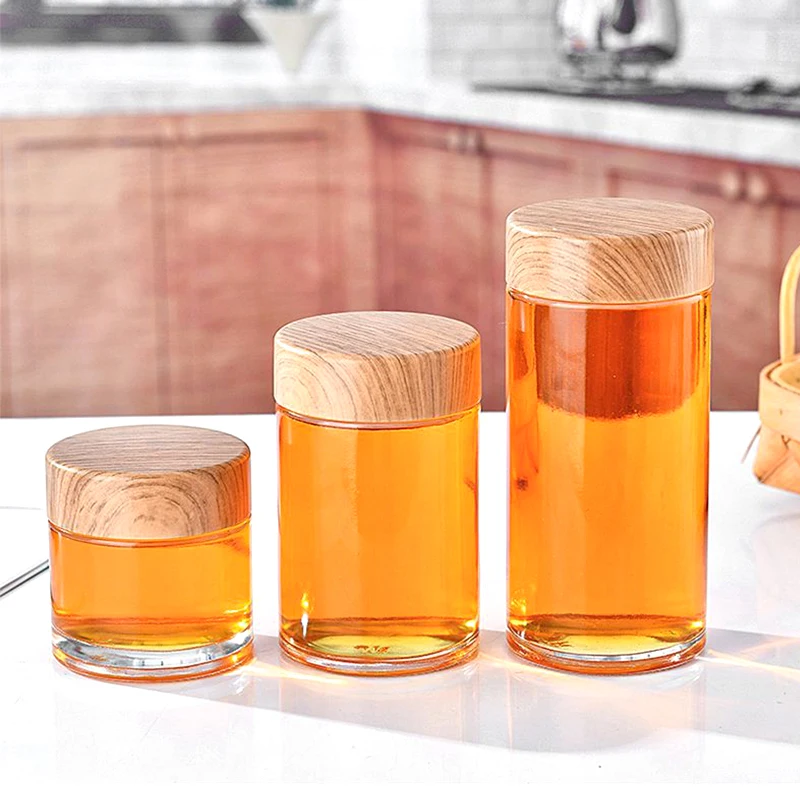 In Bulk Customized Round Glass Jar 180ml 250ml 500ml 750ml Container for Honey Jam Baby Food Storage with Wooden Metal Lid