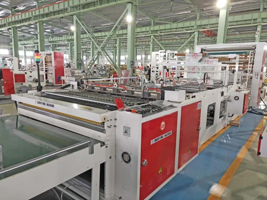 
Fully automatic plastic super sine wave top takout round handle punch bag making machine 