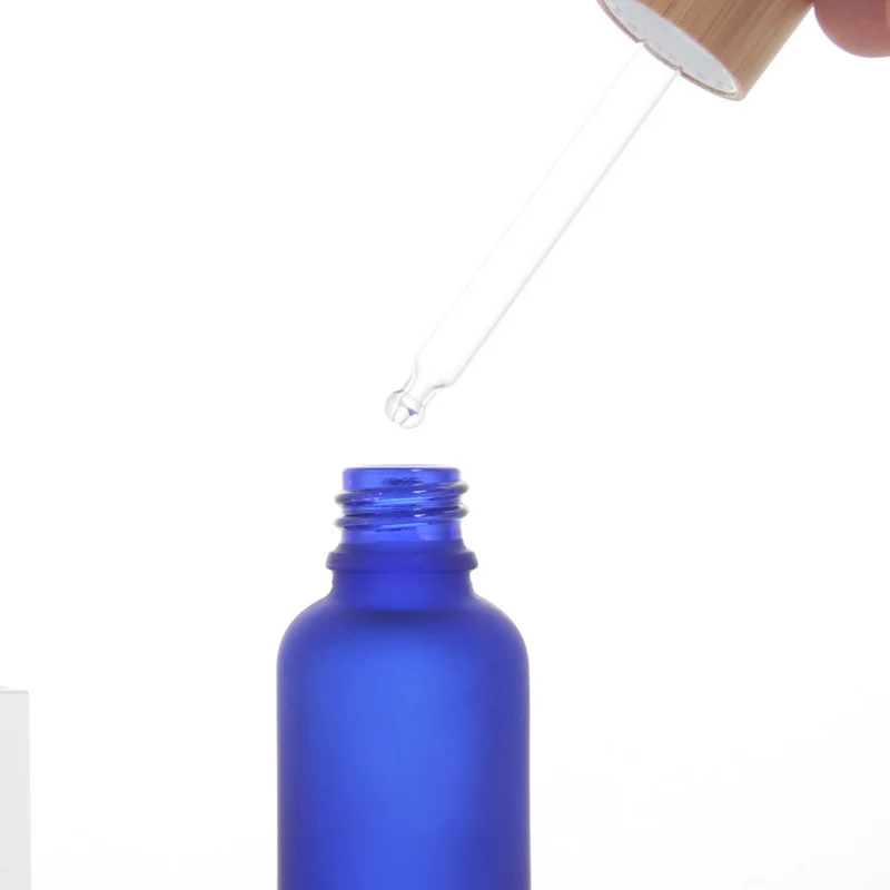 Good Price Essential Oil Glass Dropper Pipette Bottle with Bamboo Lid 5ml 10ml 15ml 20ml 30ml 50ml 100ml Available