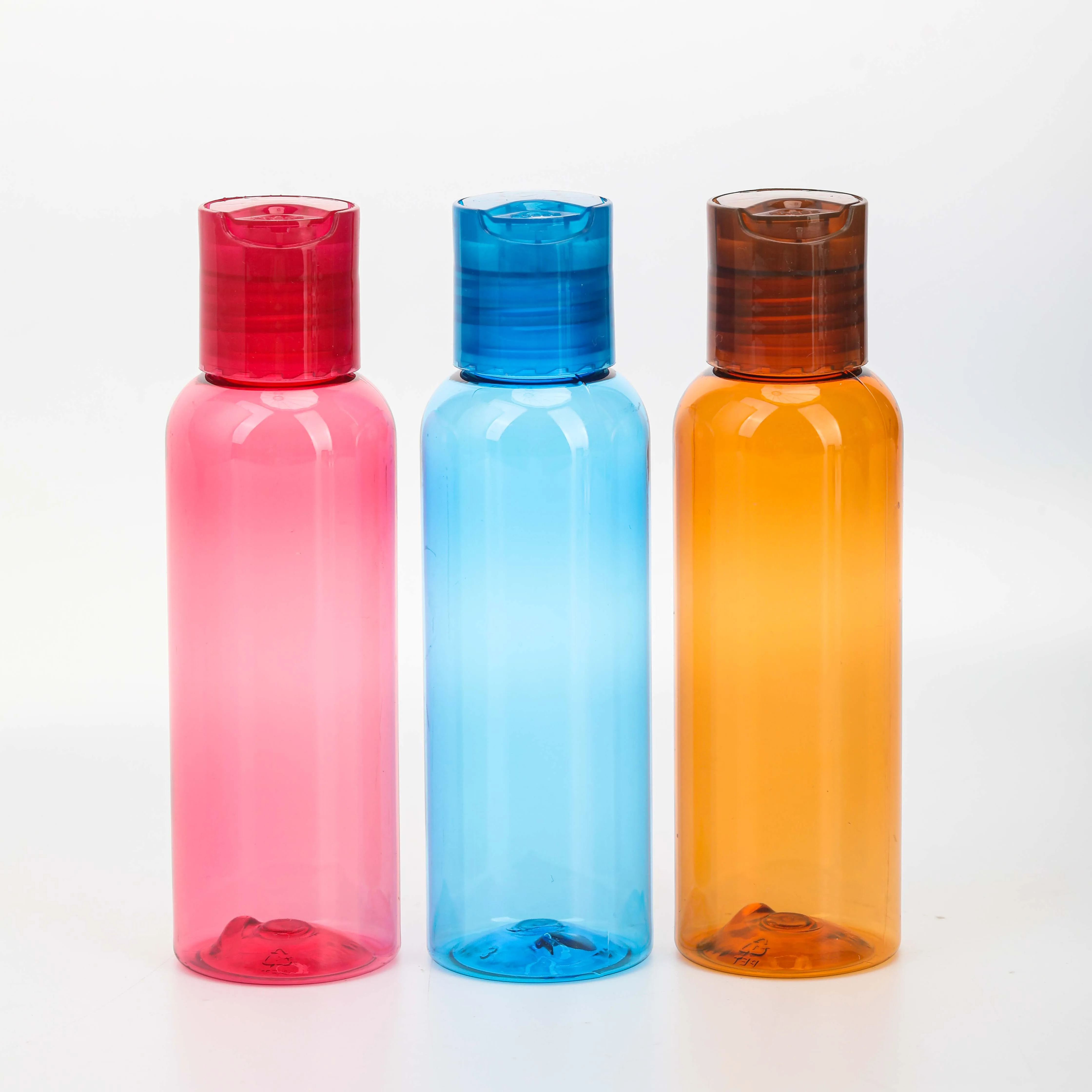 Empty red pink 60ml 120ml 2oz 4oz PET plastic Squeeze Bottles with Press Disc Top for Shampoo Lotion Cream