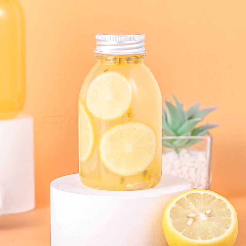 Wholesale Beverage Bottle 8oz  16oz Pearl Milk Tea Bottle Pet Beverage Vodka  Energy Shot Juice Bottle with Lid