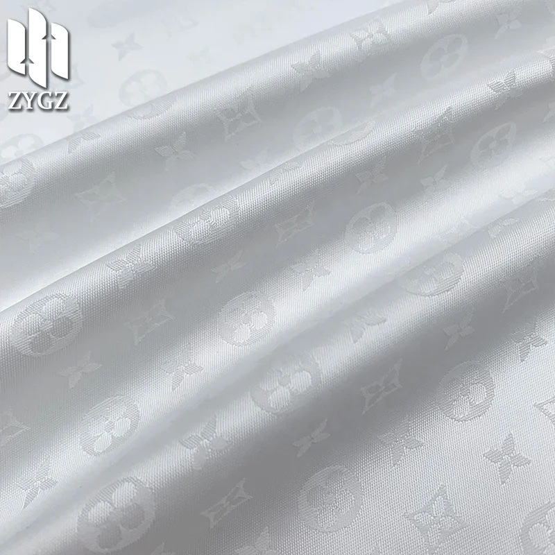 100 polyester 90GSM fashion brand jacquard yarn-dyed satin fabric clothing fabric lining wholesale