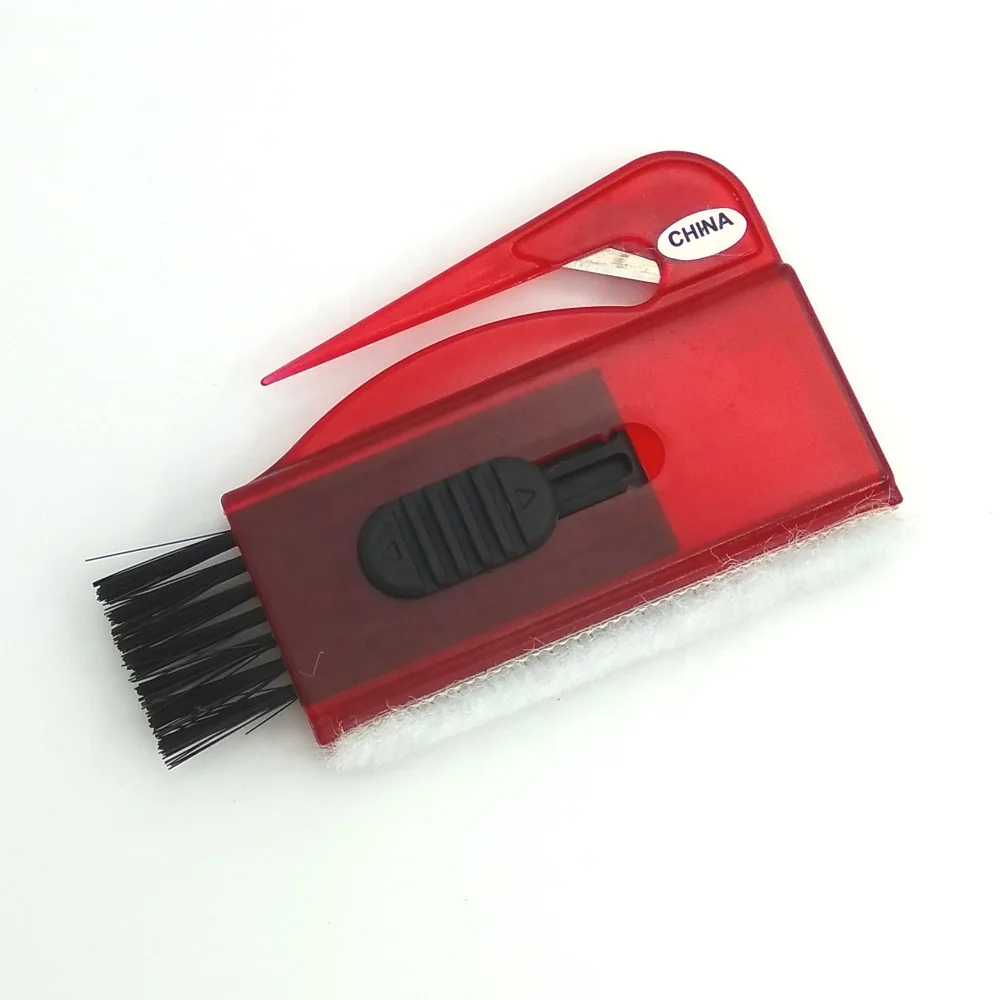 
computer keyboard brush with letter opener 