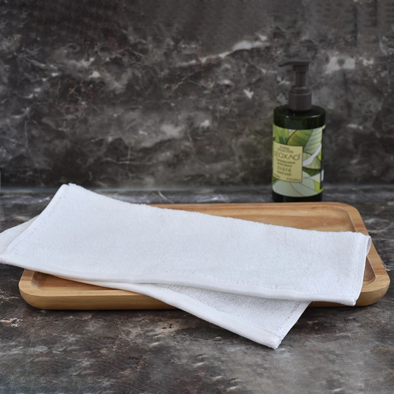 Customized logo 70g cotton hotel hotel bath sauna pedicure bath one-time cotton white towel