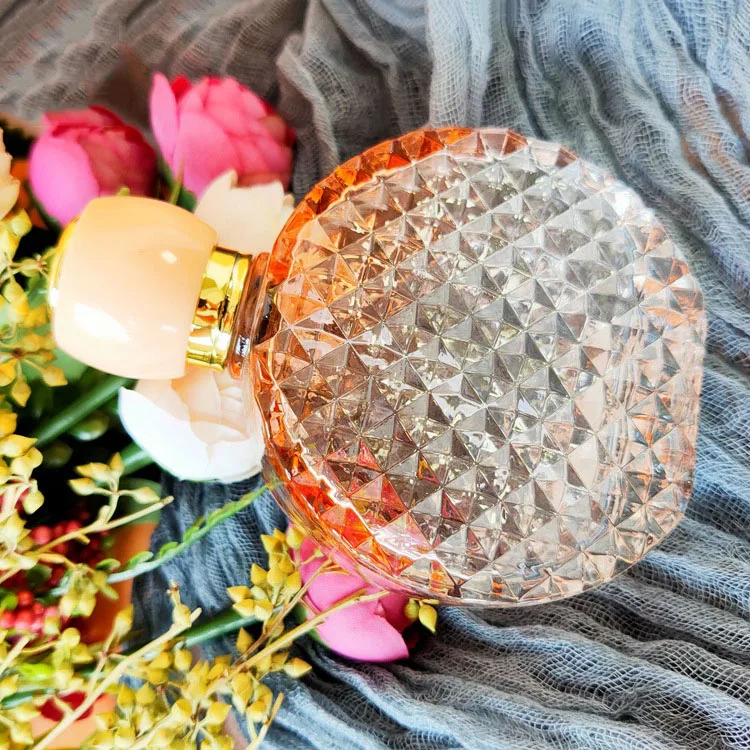 guangzhou high quality free sample glass flat round gradient bottle with pump for supplier malaysia