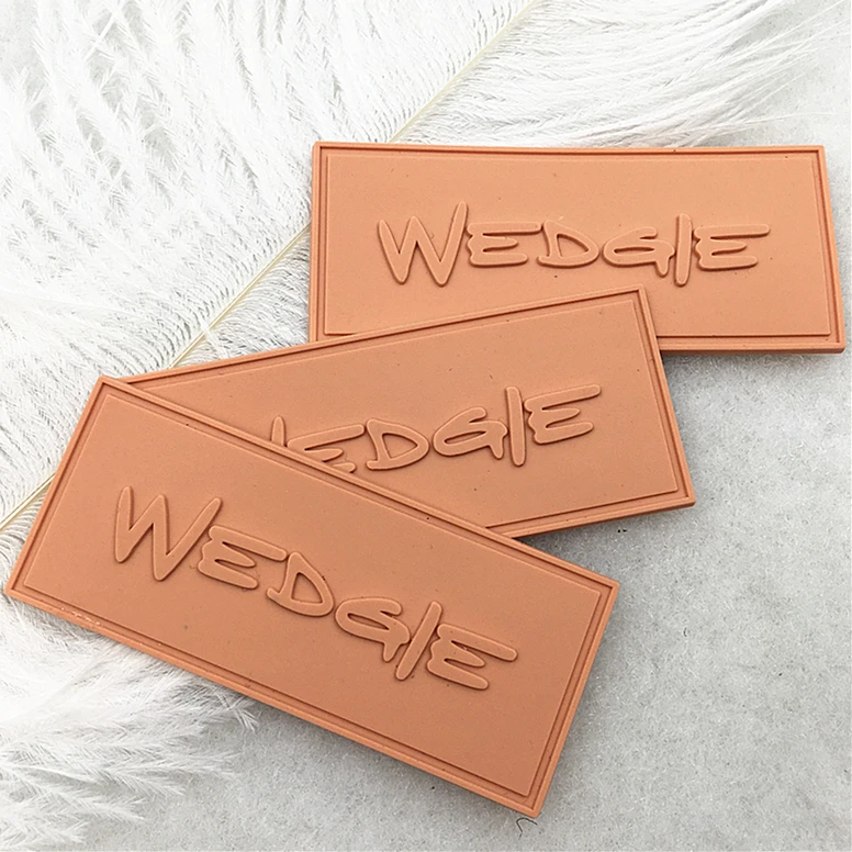 Textured 2D/3D Embossed Garment Rubber Patches High Quality Custom Private Logo Sew On PVC Rubber Labels For Clothing