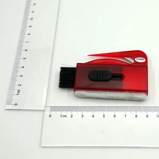 
computer keyboard brush with letter opener 