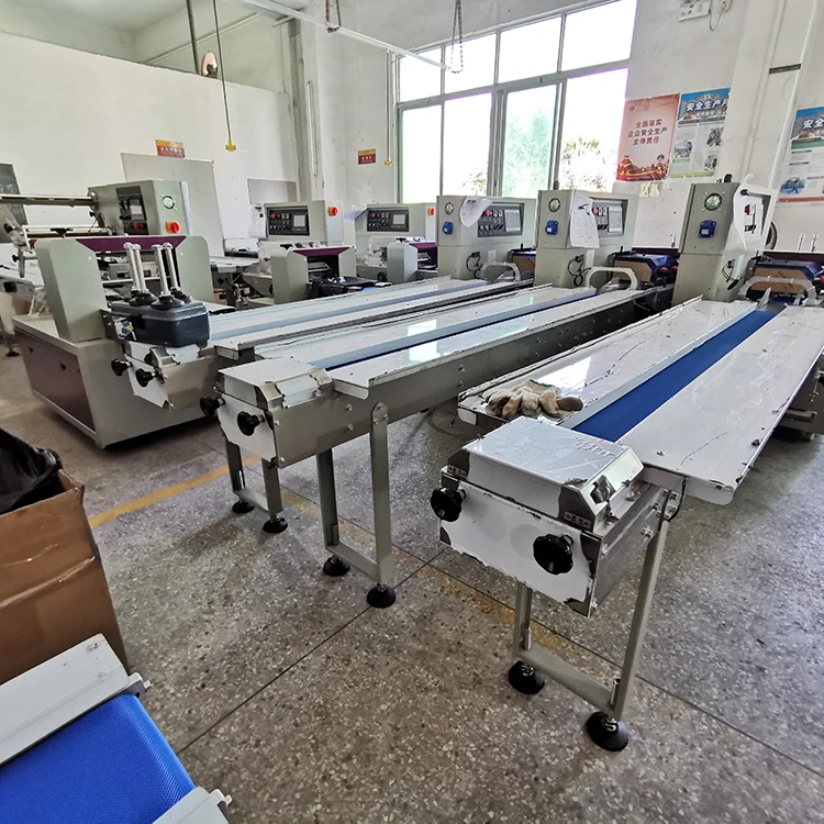 
donut machine packaging Hot Selling Donuts Pillow Full Automatic Packing Machine Bread automatic packaging machine 
