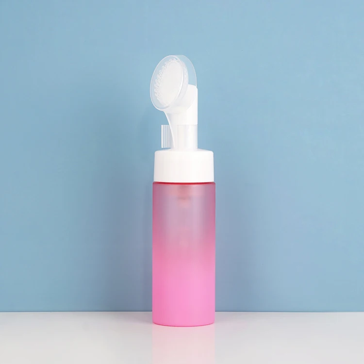 Stock Cosmetic Packaging Bottle 150ml Pink Foam Bottle With White Cleaning Massage Silicone Brush Pump