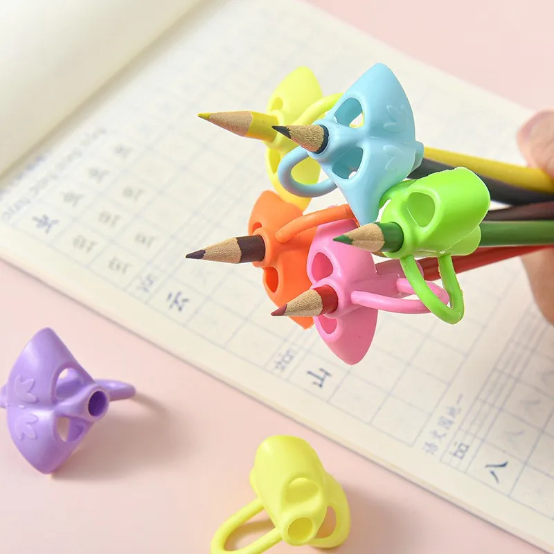 Silicone Posture Writing Pencil Grips Kids Pencil Sleeve Cover Holder Kids  Pen corrector posture correcting pencil sleeve