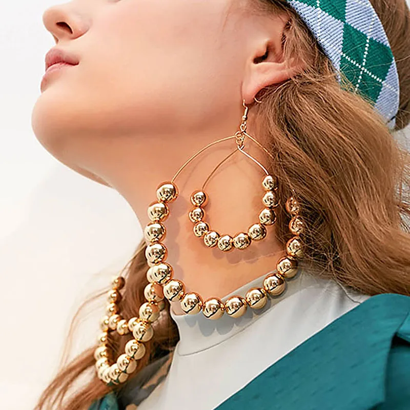 2021 new hot selling curved copper ball long stud earrings for women 18k gold plated round hoop earrings