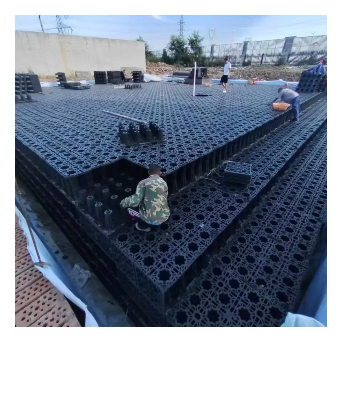 Interlocking underground stormwater attenuation tank system for residential house car parks flood mitigation