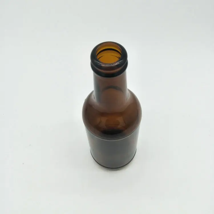 Empty Amber Beer Bottles With Crown Cap 500ml High quality factory manufactured amber glass beer bottle 500 ml