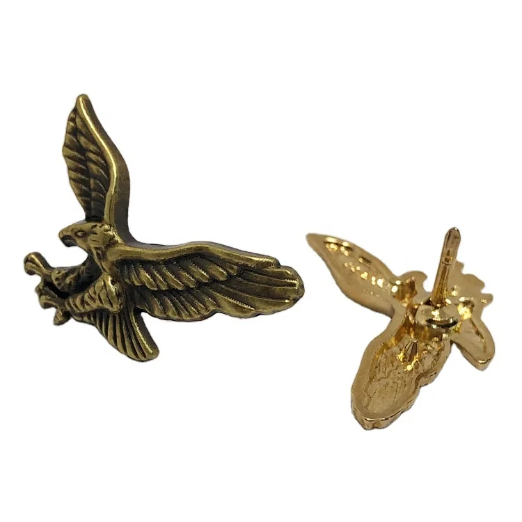 
OEM trendy metal embossed bird shape lapel pin 3D mini gold eagle badge emblem 