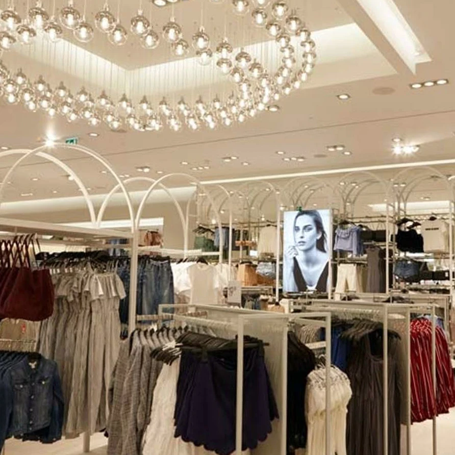 Custom Fashion Pretty Metal Stainless Steel Garment Stand Floor Wall Mounted Clothes Shelves Clothing Rack For Shop