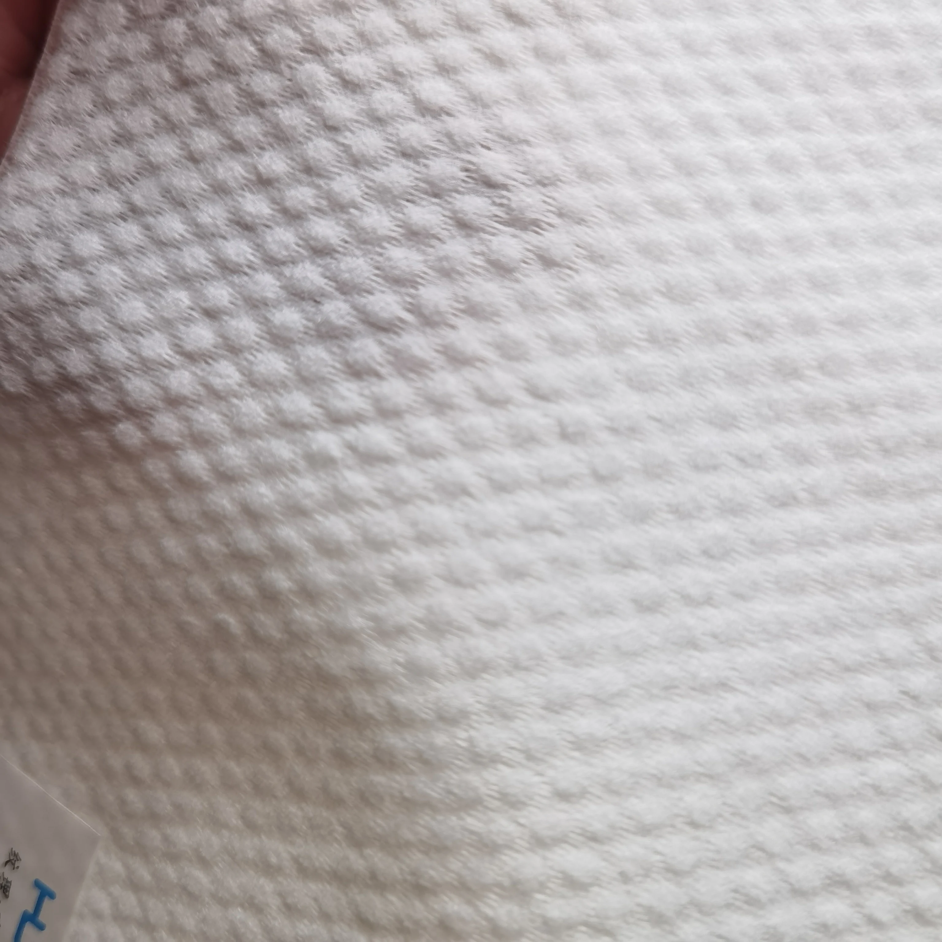 airlaid pet non woven fabricPlian Emboss Pattern Spunlace Nonwoven Fabric for Tissue Paper